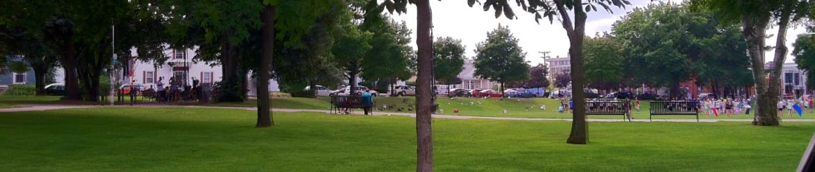 Aug. 26: A huddle of 'park people' to the left, and Central High School band member to the right, despite No Trespassing ordinance during school hours.