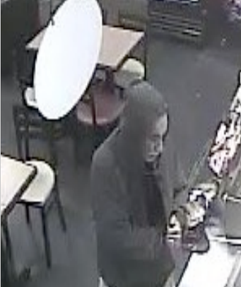 Surveillance photo of suspect in Ben & Jerry's robbery.