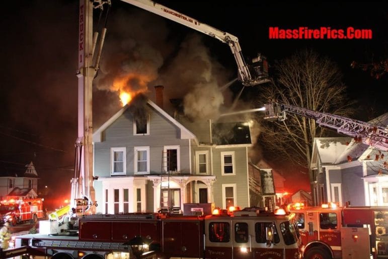 photoManchester Firefighters battle the Jan. 16 Harrison Street fire. Photo credit: Dave Stewart/MassFirePics