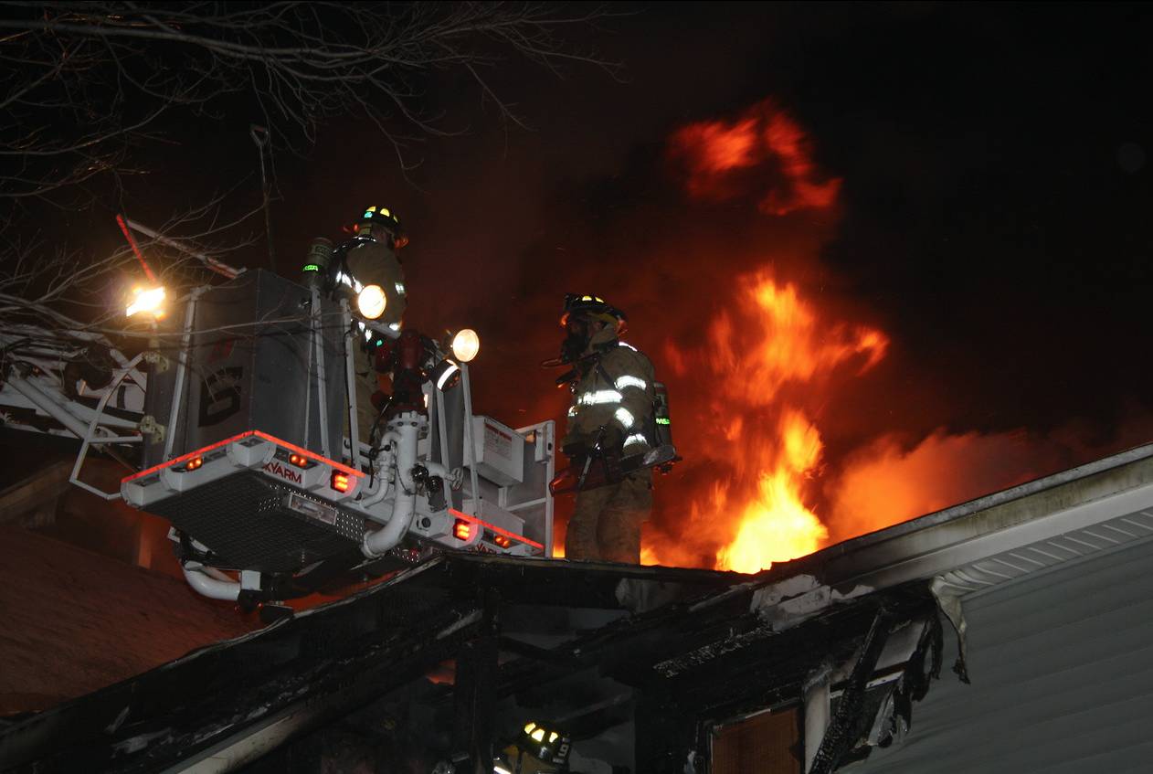 Fire consumes Harrison Street apartment house, 8 residents, 4 pets rescued