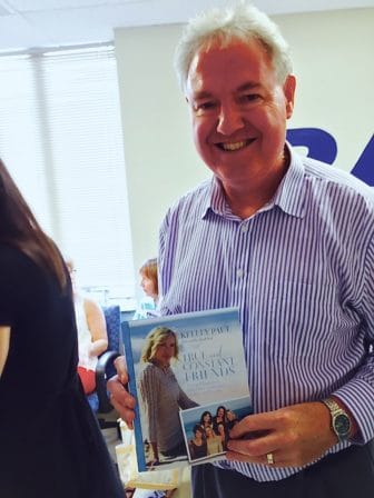 Chris Van Veen of Brookline, with his copy of Kelley Paul's book.