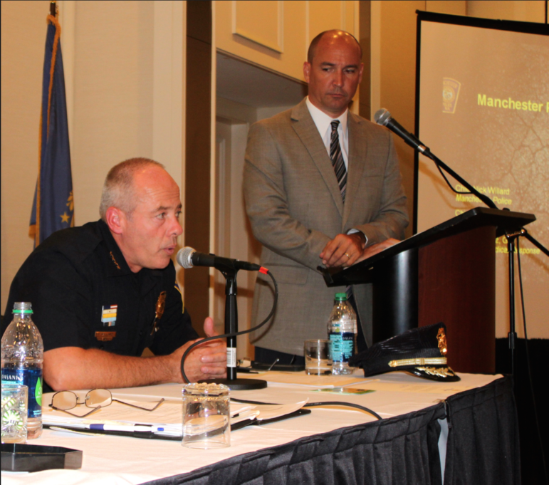 Chief Nick Willard leading a community forum on the heroin crisis at the Radisson.