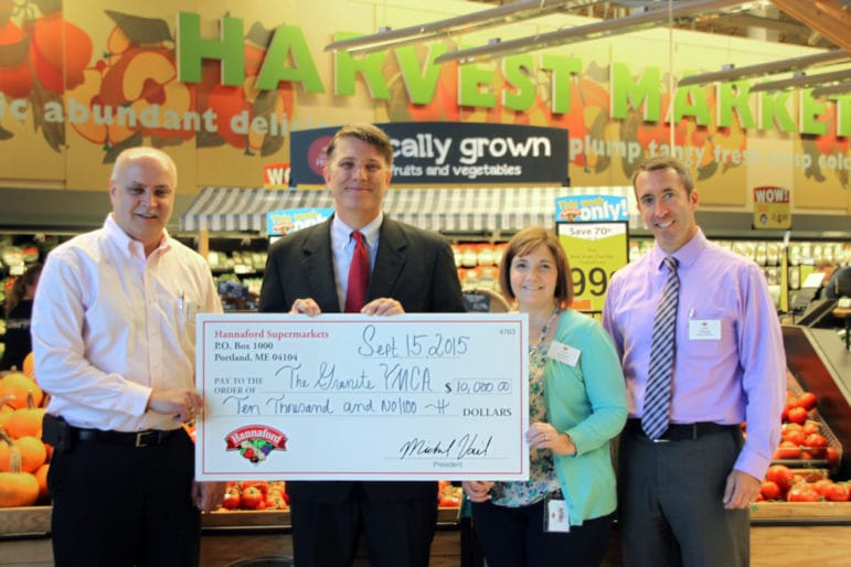 From left, Carl Provencher-Store Manager, Goffstown Hannaford; Chris Dugan- VP of Marketing, Granite YMCA; Lisa Lessard-Store Manager, John Devine Drive Hannaford in Manchester; and John Fifield- Director of Operations for Hannaford Supermarkets in Central New Hampshire.