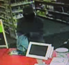 Masked robber from CVS surveillance footage.