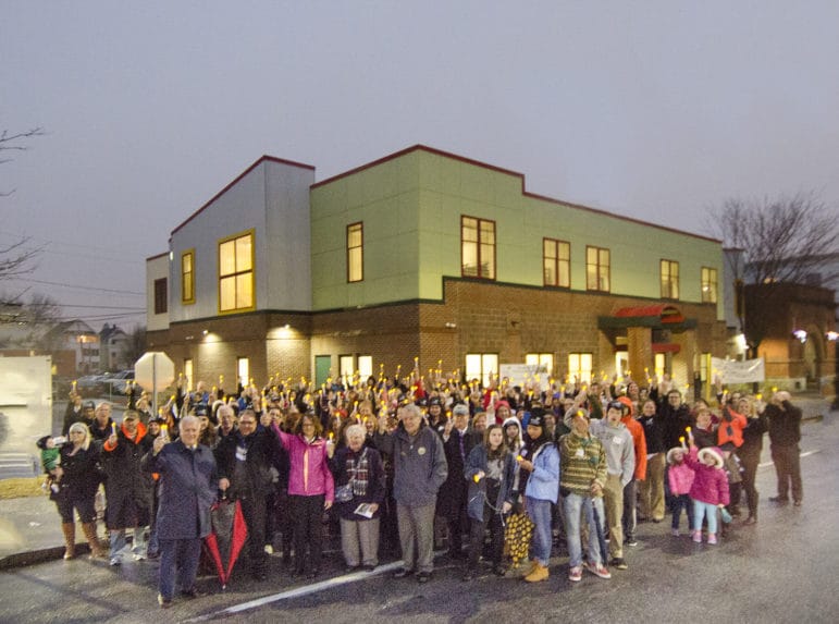 Supporters gather outside the new FIT center on Lake Avenue.