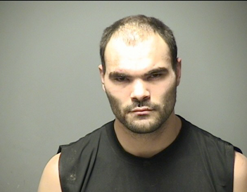 Man challenges officer to fist fight after he was told to dump his beer