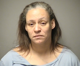 Woman charged with stabbing man over bottle of Valium
