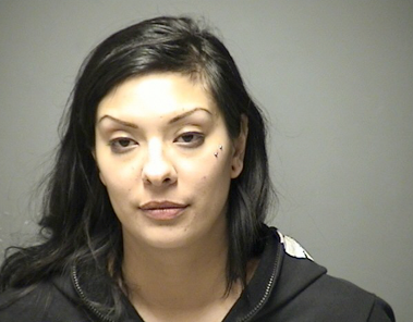 Quick action by cop prevents car from hitting pole as driver slumped behind wheel