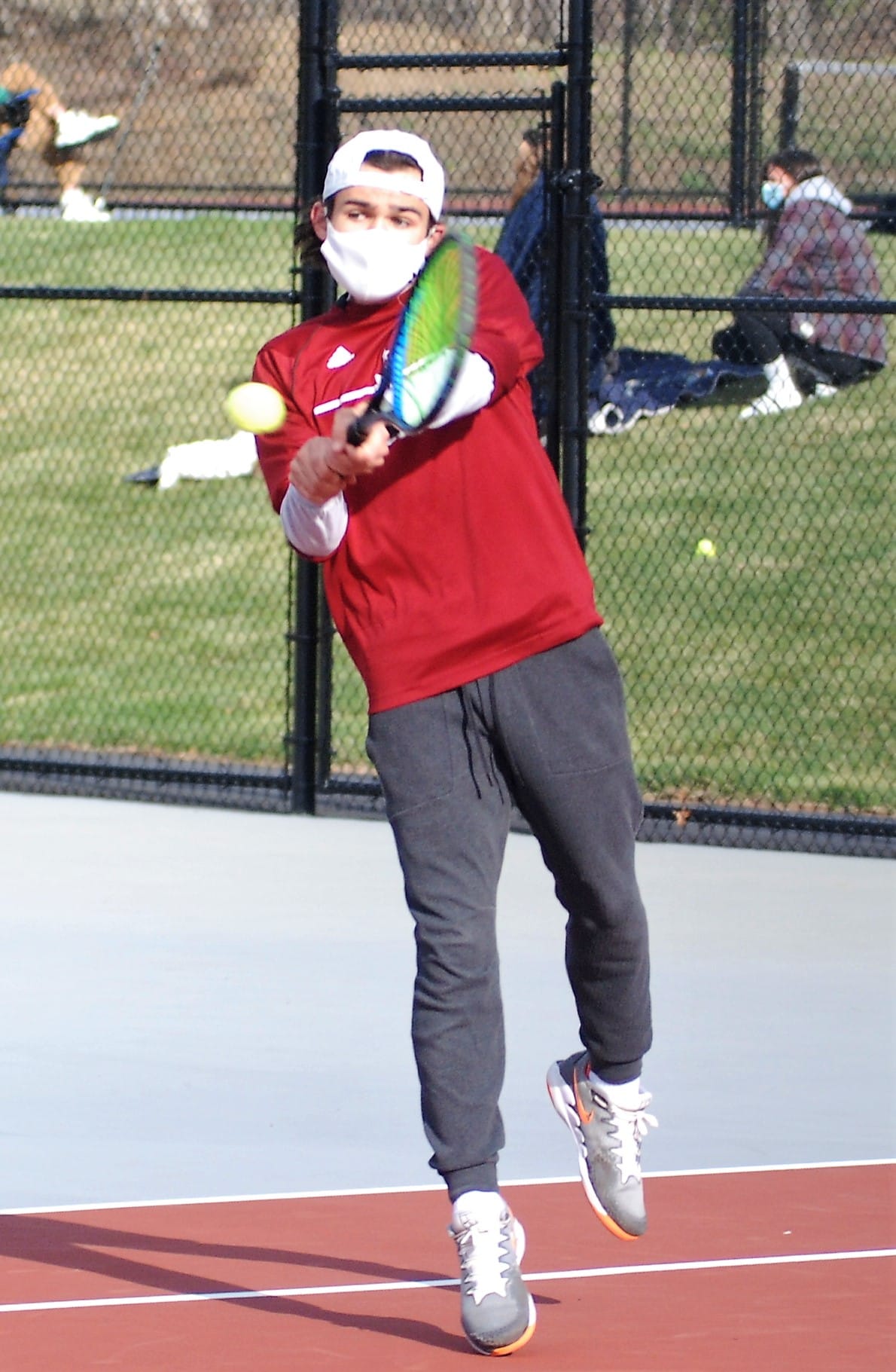 Jack Schroeder playing tennis