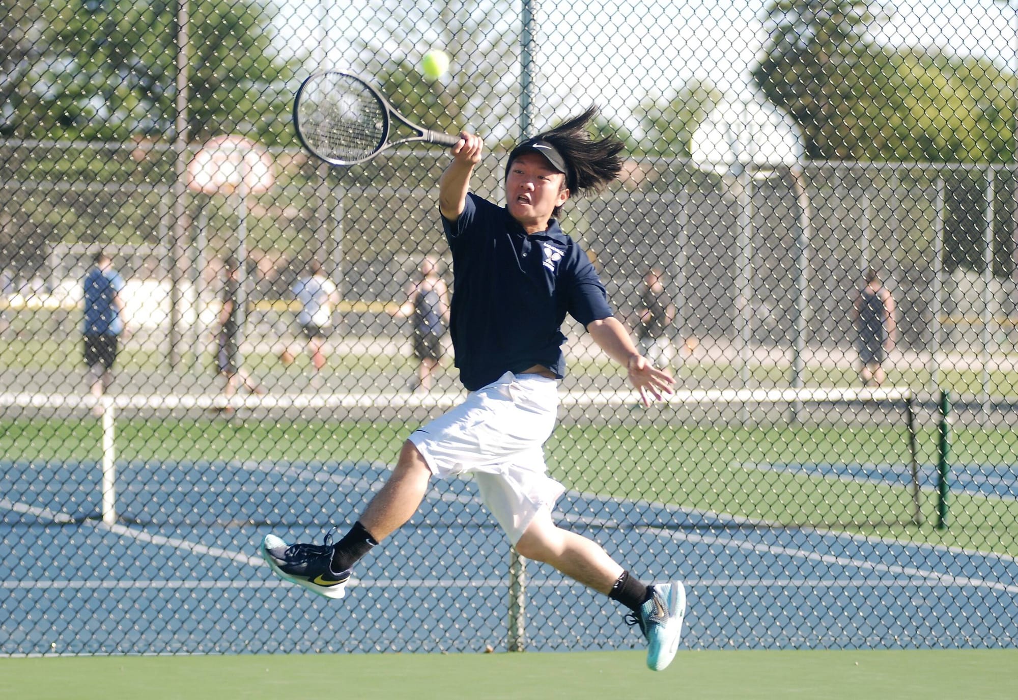 City boys bounced from tennis tourney