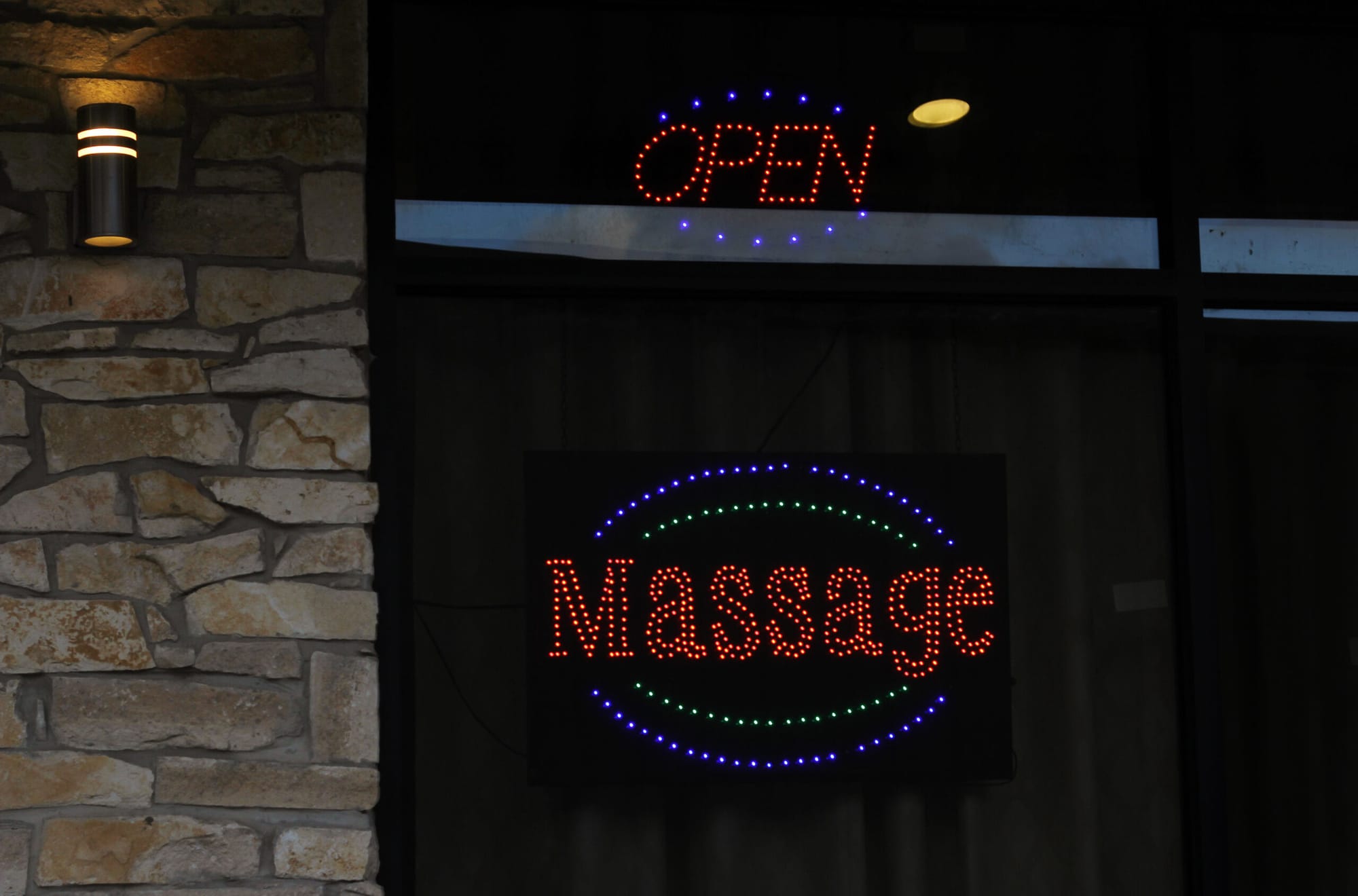 Does NH need to license massage establishments?