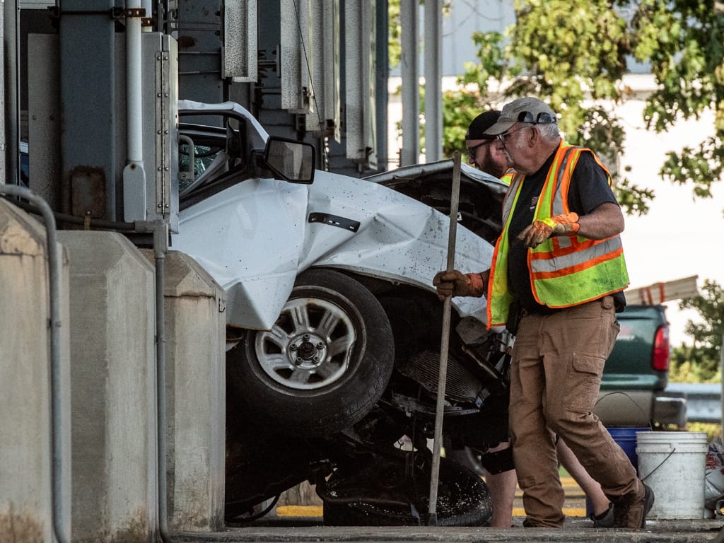 Rush hour crash at Bedford tolls