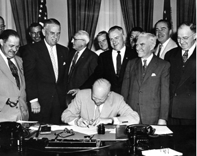 President Eisenhower signing HR7786, changing Armistice Day to Veterans Day.