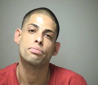 Alleged burglar triggers alarm, breaks in, naps post image