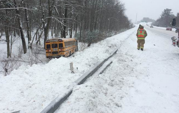 School bus driver loses control, bus veers off I-93, snarls traffic post image