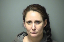 Woman charged after throwing bags of crack in snow during traffic stop post image