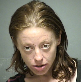 Woman arrested just before injecting herself with heroin in parking garage post image
