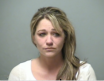 Erratic driver under the influence of heroin pulled over by off-duty cop, needles found on passenger seat post image