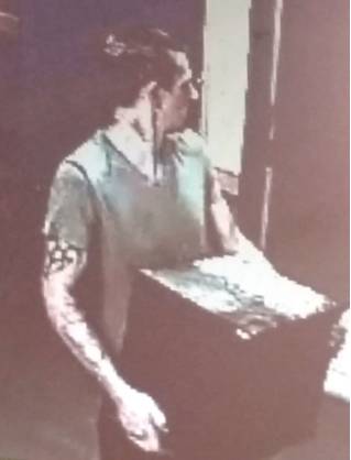 Police seek this man with tribal tattoo in connection with Subway robbery post image