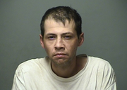 Robber with box cutter hides in utility shed, gets sniffed out by police dog post image