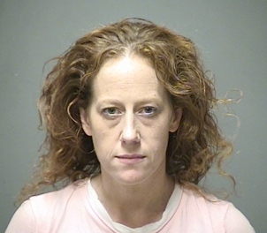Woman slumped behind wheel had heroin, digital scale, 3 phones, $1,845 and stun gun post image