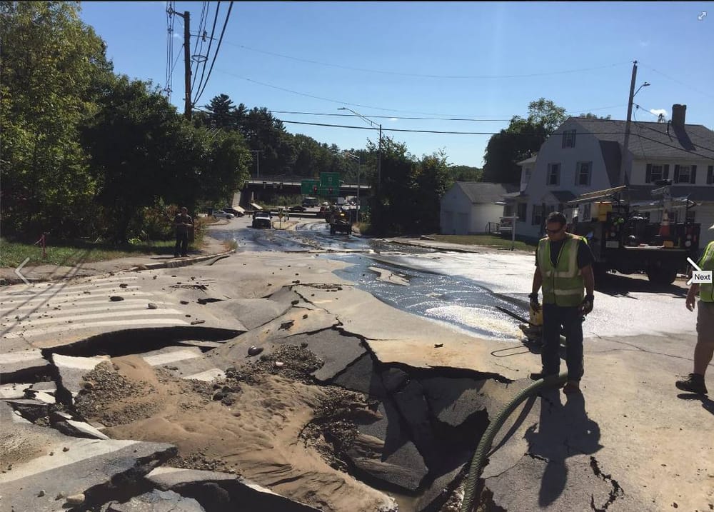 Water main break and road collapse snarl traffic, leave residents without water post image