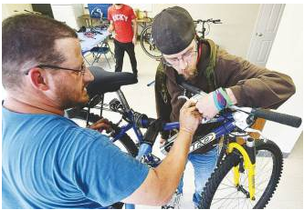 Manchester Police partner with QC Bike Collective, donate unclaimed bicycles post image