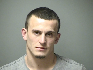 Patron ends up in fight outside bar with police officer, charged with assault post image