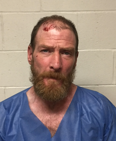 Man found hiding in field after crashing car, left behind injured passenger, dog post image