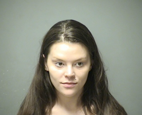 Woman turns herself in on conspiracy charges in botched robbery post image