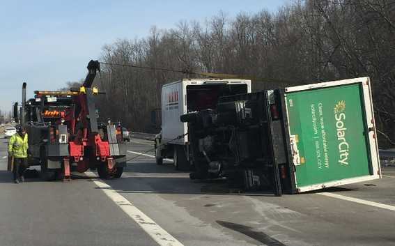 Box truck overturns on I-93, traffic snarls; driver cited for following too closely post image
