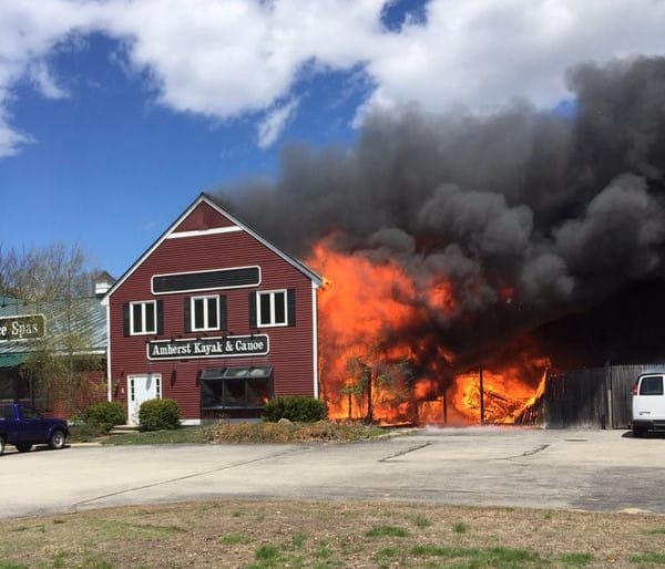 A 4-alarm fire shuts down Rte. 101A and destroys businesses post image