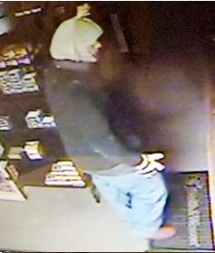 Robber in odd hat caught on film inside taxidermy shop, steals gun, ammo post image