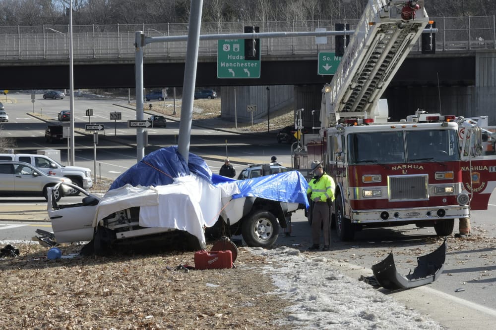 Woman dead following Everett Turnpike crash post image