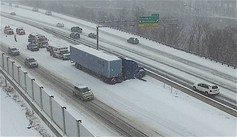 Roads get slick quick as snow falls, causing accidents around the city post image