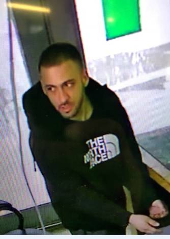 Police seek help in identifying suspect in theft of cash from local business post image