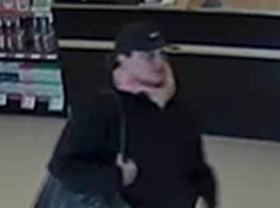 Photo of ‘person of interest’ in liquor store thefts circulated by NH State Police post image