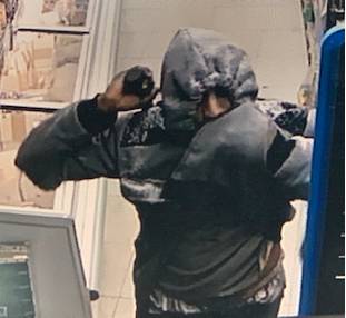 Clerk at Shop-N-Go refuses to hand over cash to robber armed with gun, sledgehammer post image
