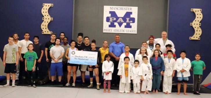 Manchester Police Athletic League receives donation from the National Police Association post image