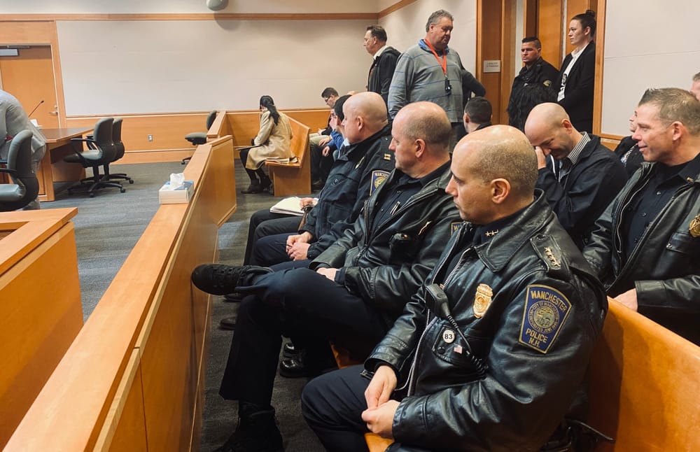 Large police turnout in court for arraignment of man accused of stabbing 3 officers post image
