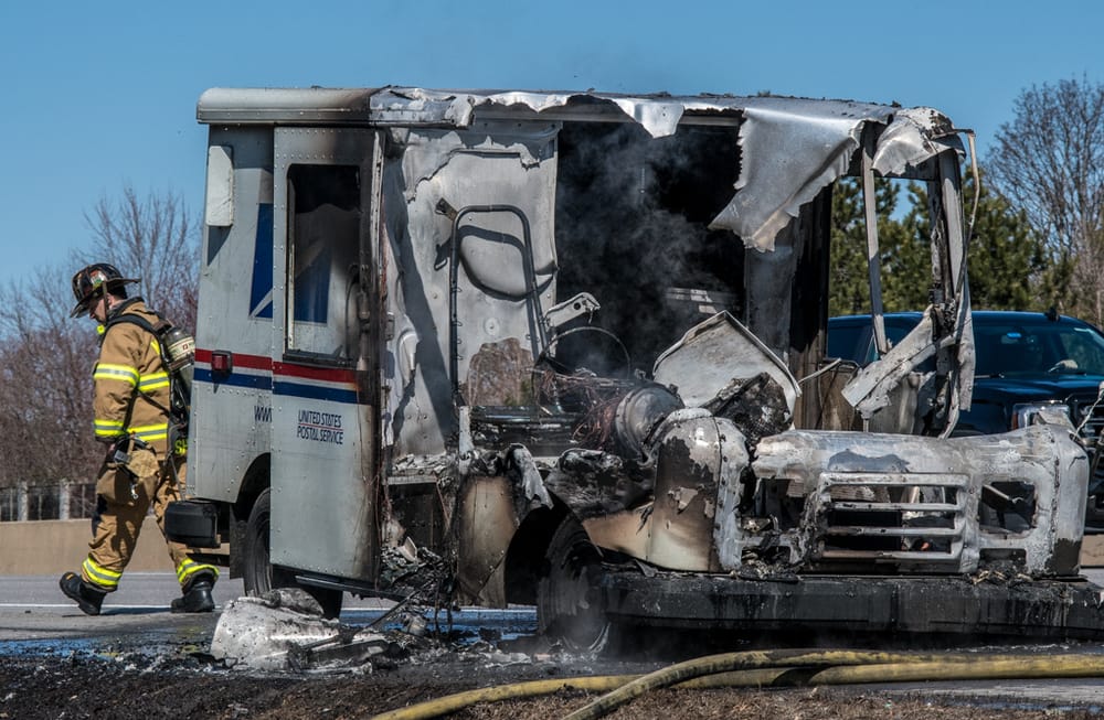 Mail truck on fire pulls off Everett Turnpike in Nashua, gutted by flames post image