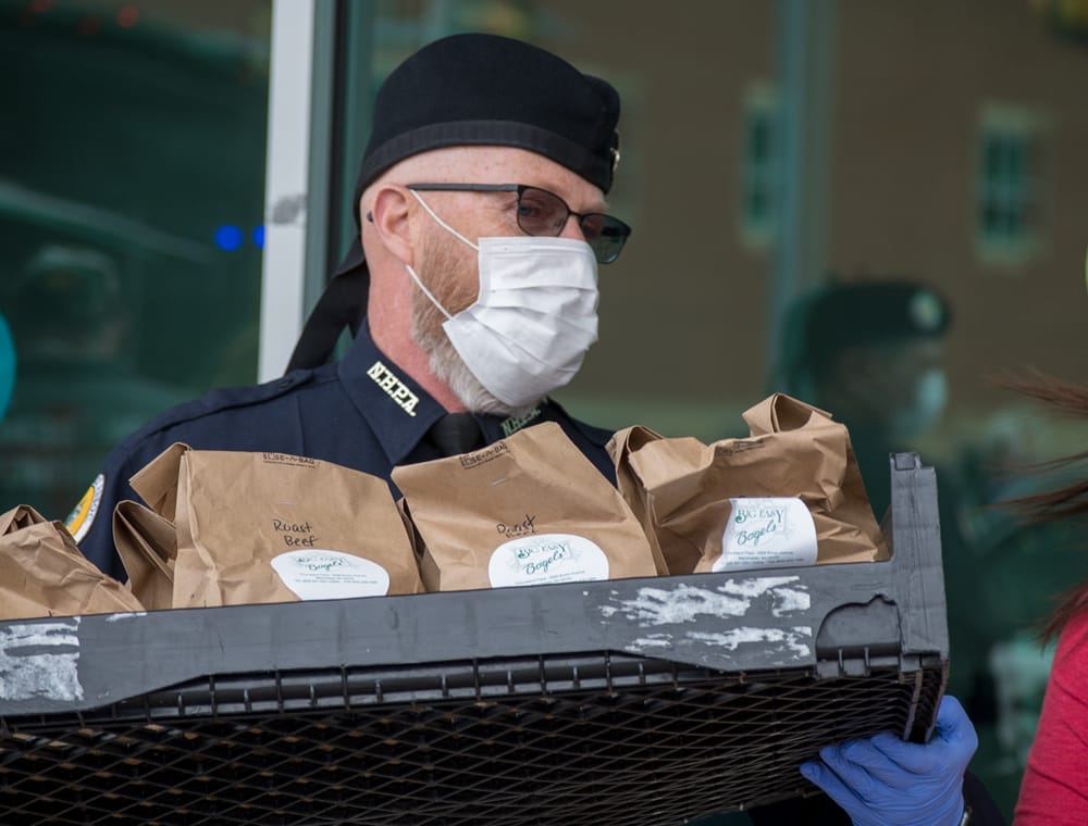 Law enforcement delivers lunch to Emergency Room workers, bag pipers play post image
