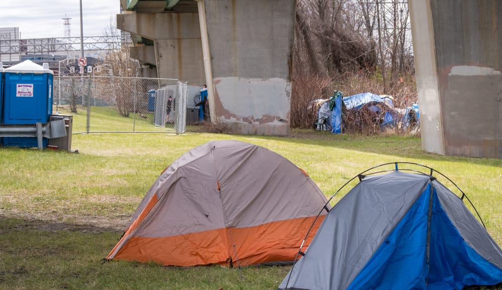 Homeless people in tents struggle while city outreach increases post image