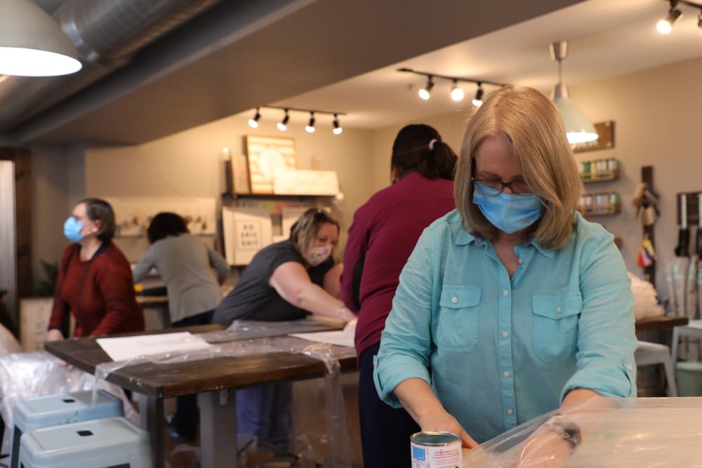 Nurses make it happen: Invent pattern, assemble volunteers, crank out disposable and washable gowns post image