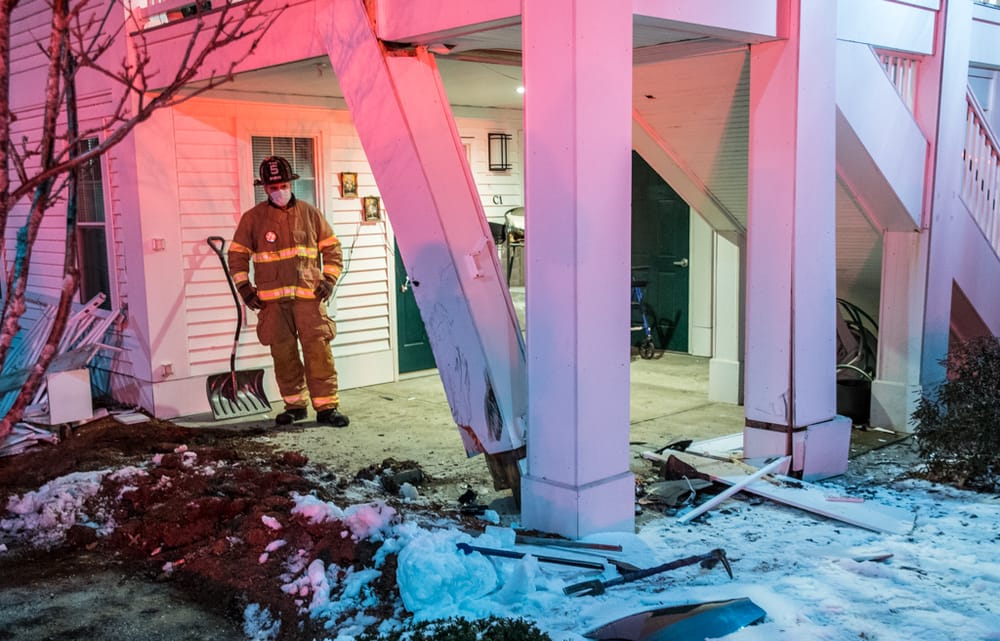 SUV strikes building causing damage to support beams post image