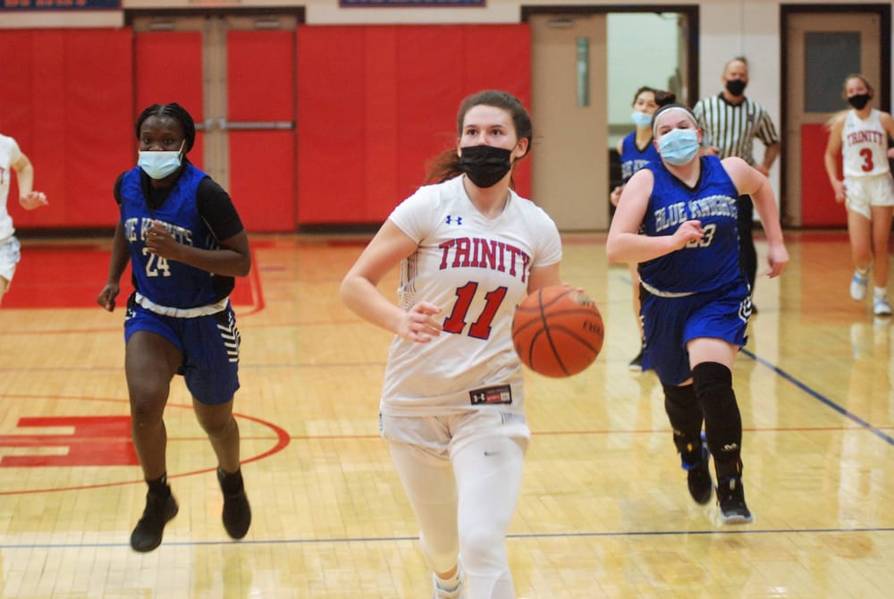 Trinity girls sprint past West post image