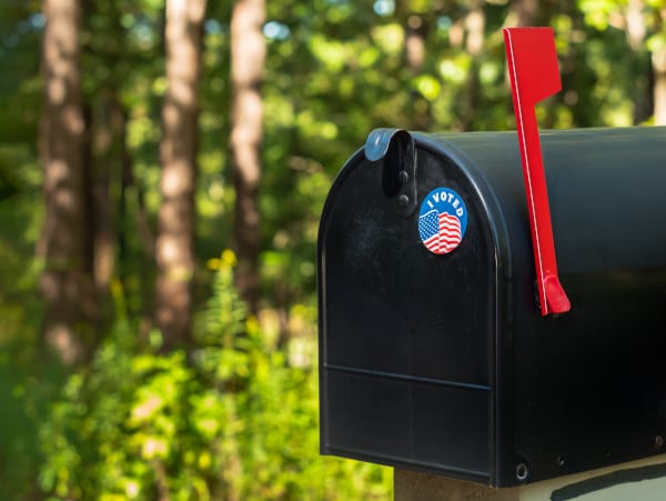 Should towns be allowed to process absentee ballots early? post image