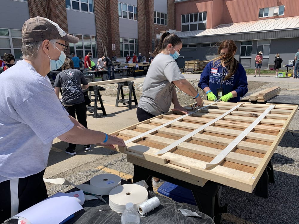 Building Beds, Building Community: Manchester Community College students roll up their sleeves post image