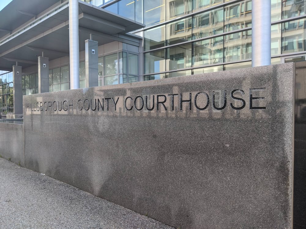 Domestic violence charges land convicted killer back in prison post image