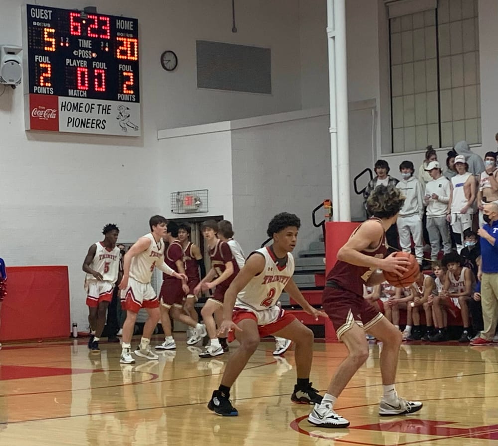 Ironclad defense carries unbeaten Trinity past Portsmouth, 44-36 post image